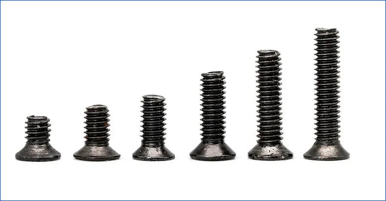 Box of black laptop machine screws with countersunk cross head, 1.4mm diameter.