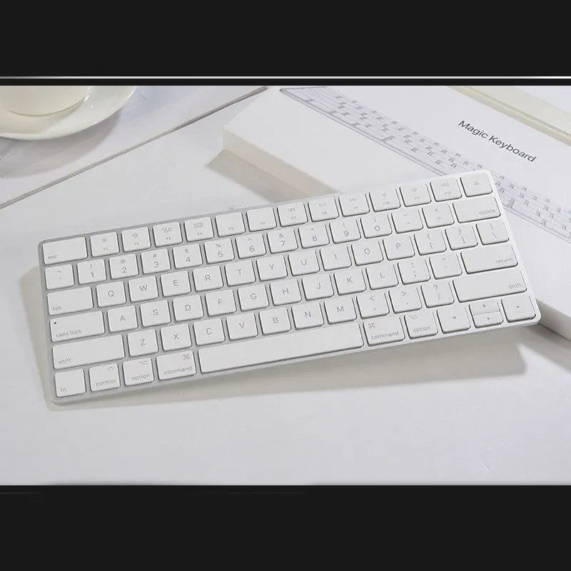 Apple Bluetooth wireless keyboard with white finish and ultra-thin metal casing