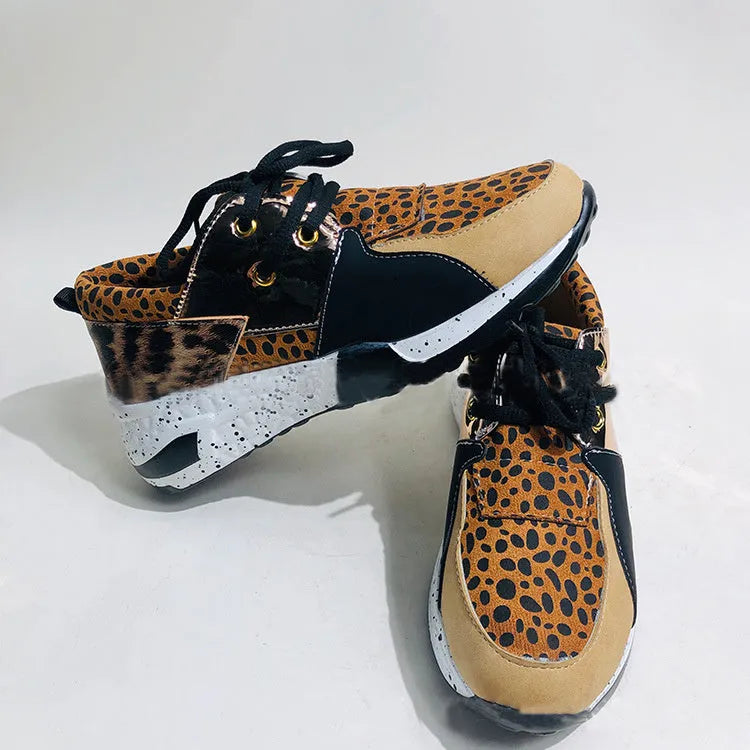 Women's casual suede sneakers with wedge heel in various colours and patterns.