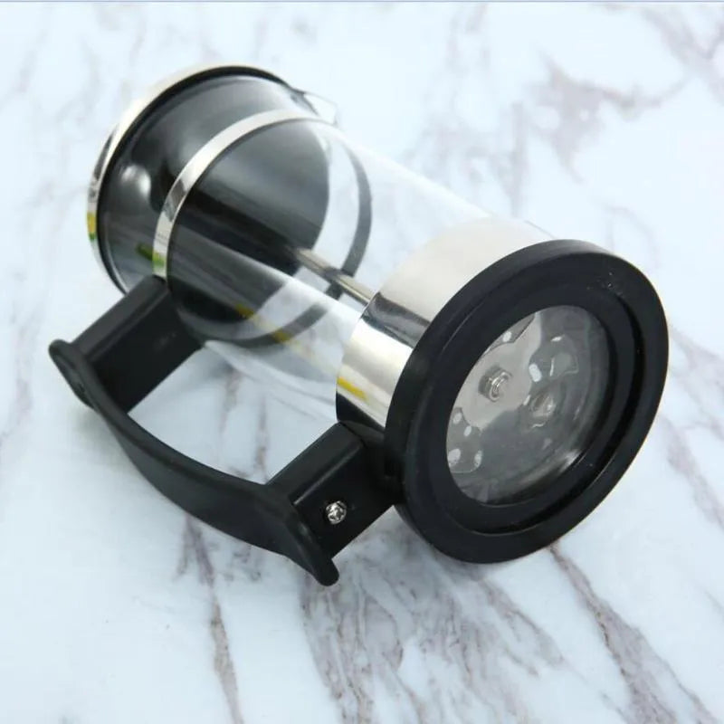 Glass French press coffee maker with stainless steel plunger showing 350ml capacity markings