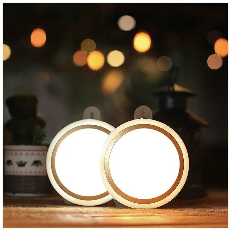 Compact circular motion sensor LED light with PIR sensor, 80mm diameter, for wardrobe and corridor lighting.