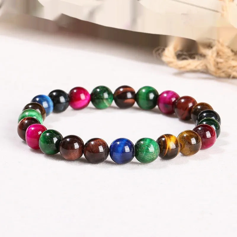 Geometric colourful Tiger Eye gemstone bracelet showing mixed natural colours on a string, available in multiple bead sizes.