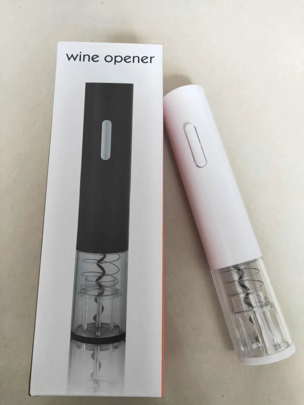 Black automatic electric wine opener kit with foil cutter and transparent body section