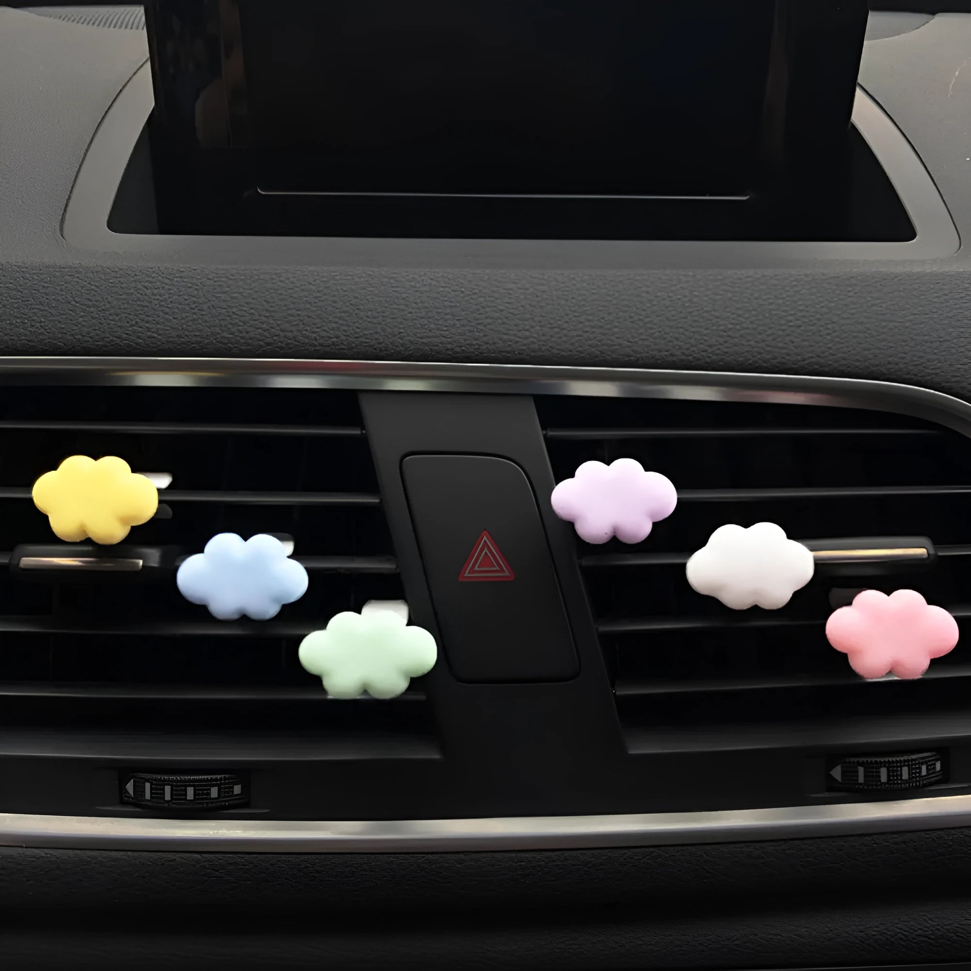 Resin car fragrance clip with Baiyun cartoon cloud design mounted on car air vent