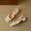 Women's beige woven closed toe sandals with a chunky 4cm heel and belt buckle fastening.