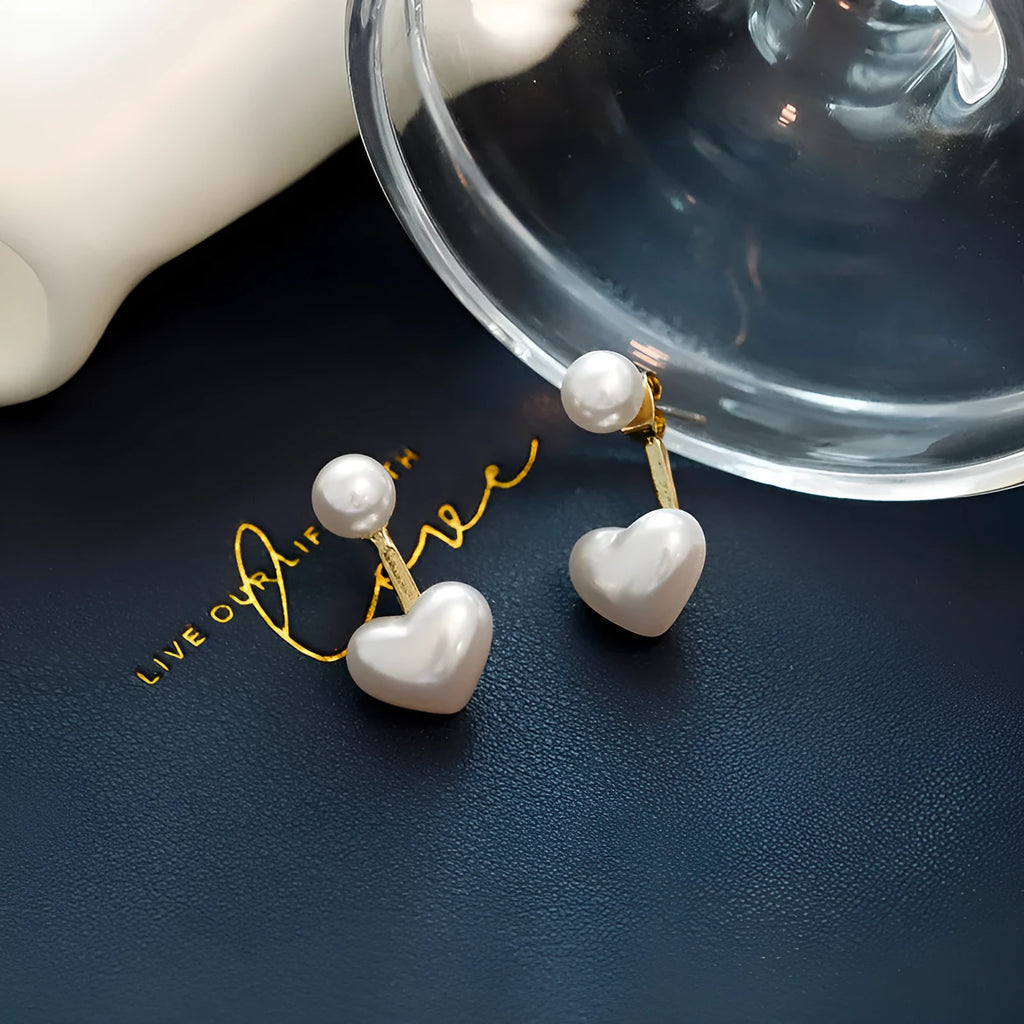 Heart-shaped pearl stud earrings with artificial gemstone accents on electroplated alloy settings