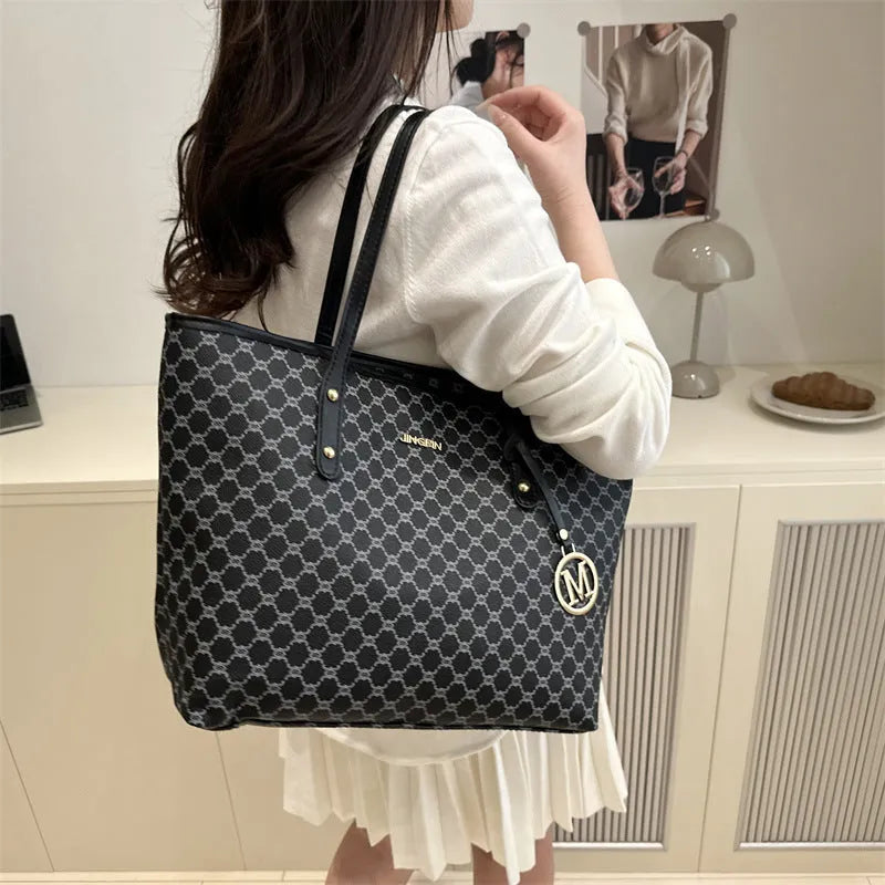 Western style shoulder bag in PU leather with sewing thread detail showing black colour option