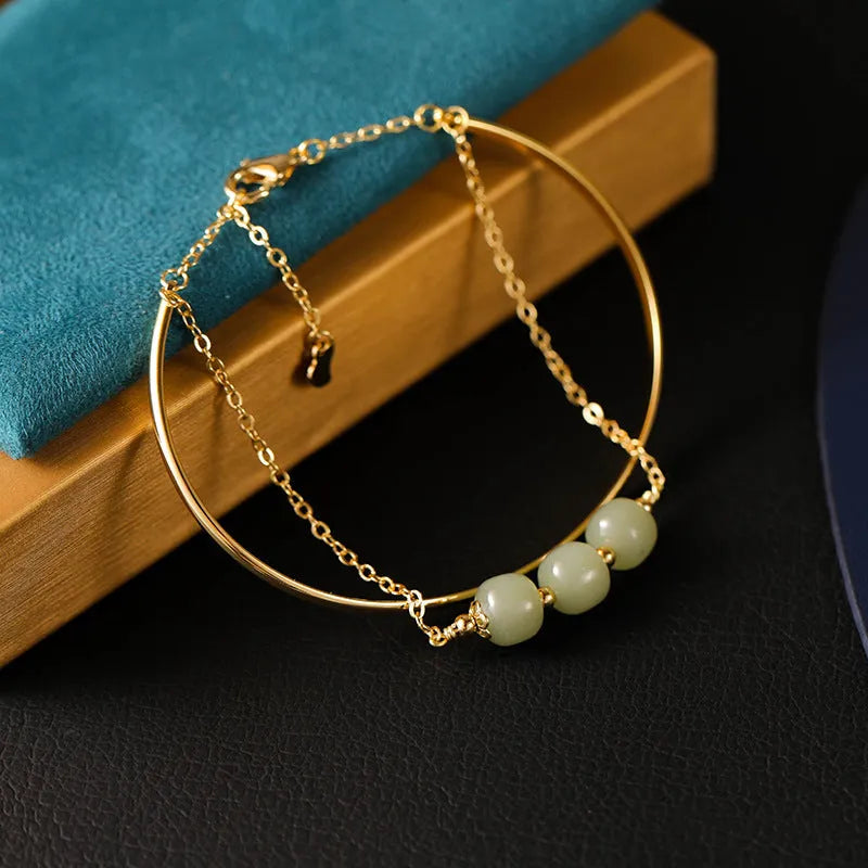 Hetian jade women's bracelet with gold inlay and lucky beads, shown in single, double, and three-bead versions.