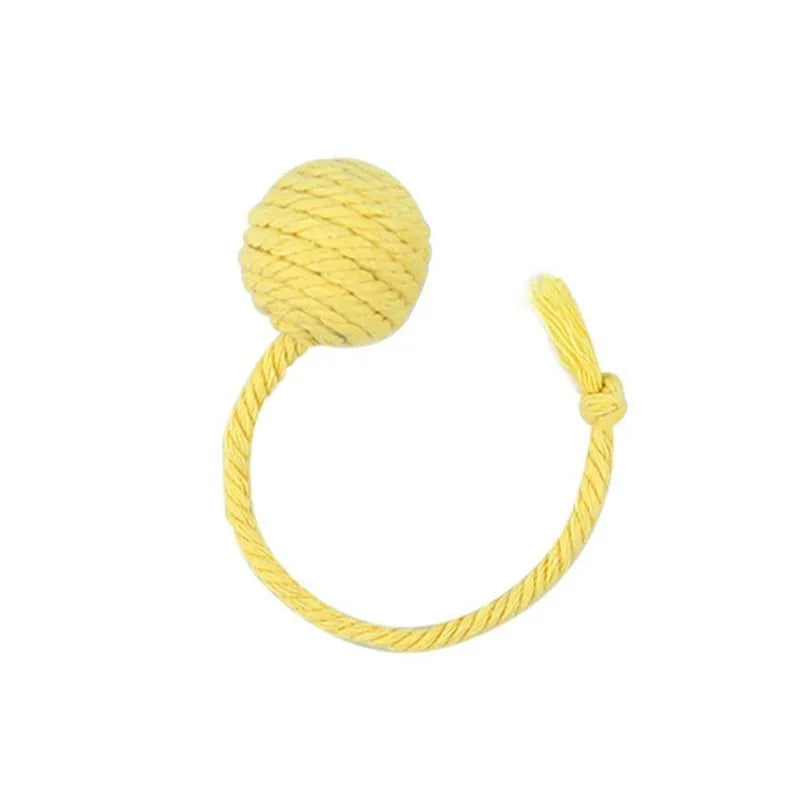 Colourful cat toy ball with a rope and built-in bell for interactive kitten play.