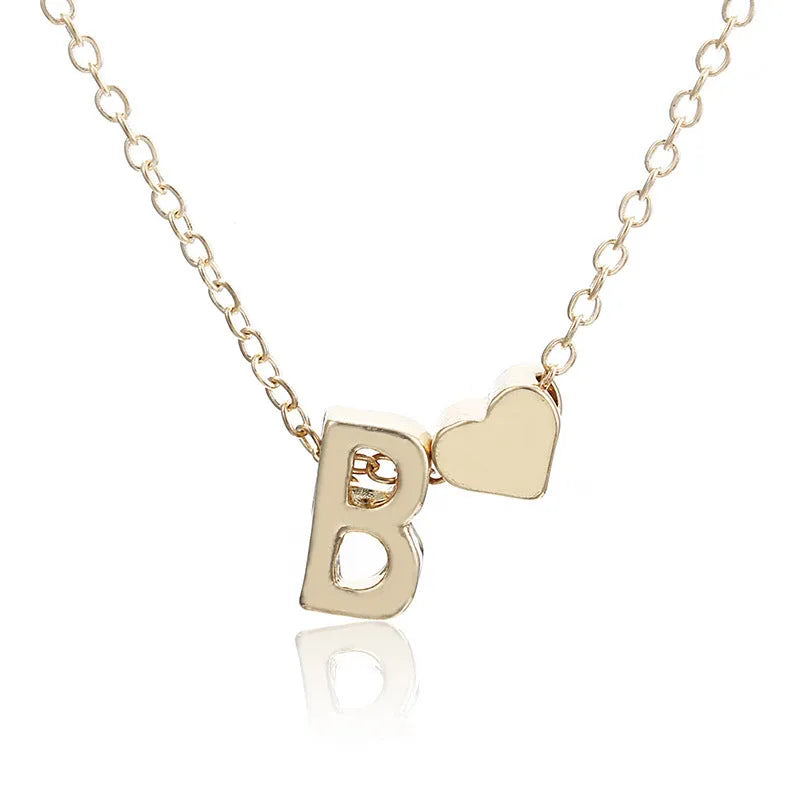 Peach heart shaped letter necklace pendant in alloy with gold and silver finish options
