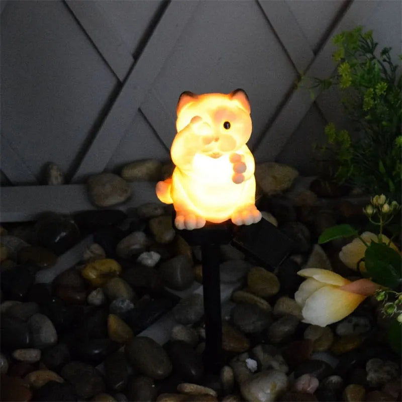 Brown resin cat-shaped solar lawn light with ground spike for garden lighting