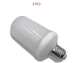 Atmosphere decorative flame effect LED bulb showing orange flickering light against a dark background.