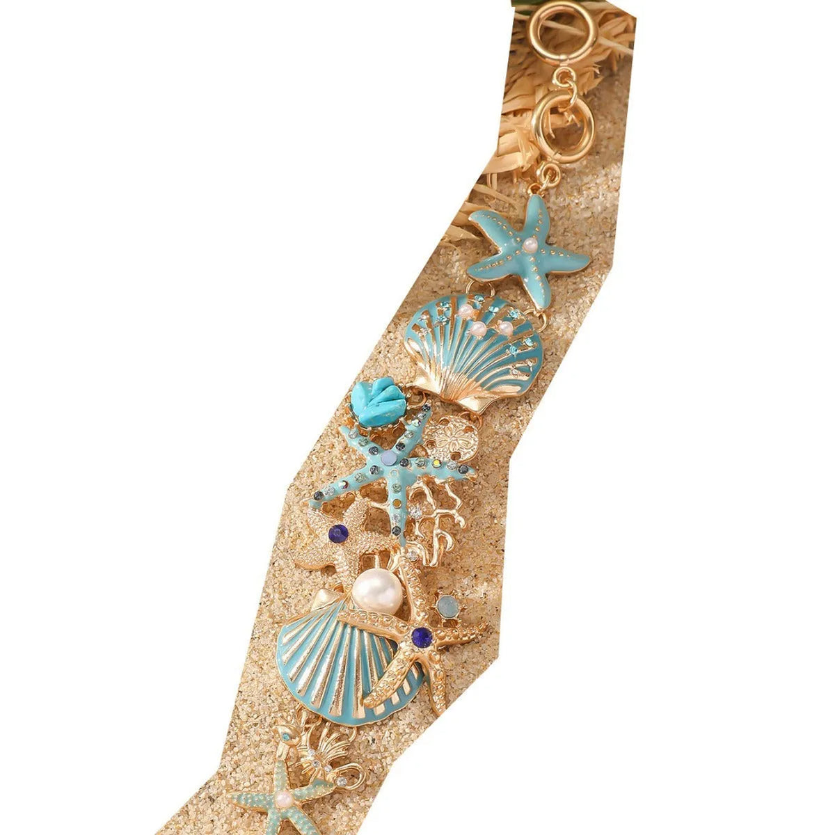 Women's alloy rhinestone bracelet featuring marine anchor and starfish design in coastal colours