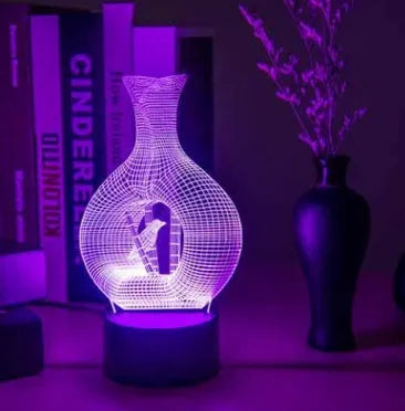 3D acrylic LED night light with ABS base showing colour changing illumination