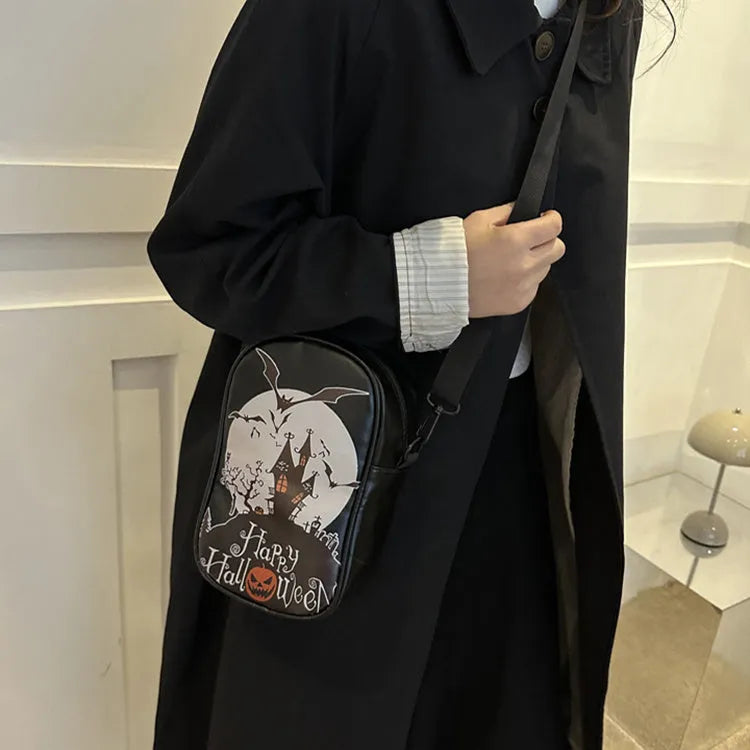Halloween graffiti phone bag with pumpkin ghost bat cartoon print, black colour, crossbody strap.