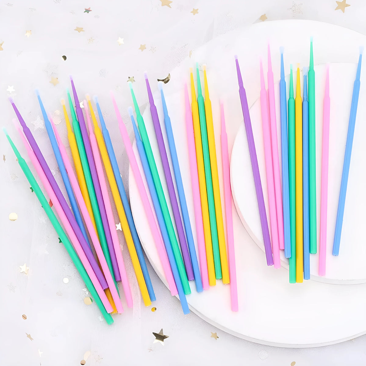 Pack of disposable micro applicator brushes with colourful bendable handles and cotton tips.
