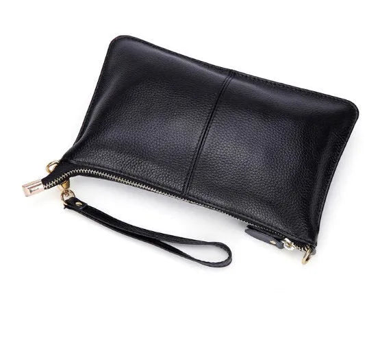 Lady's cowhide slant bag with hand strap and long shoulder strap shown in multiple colours.
