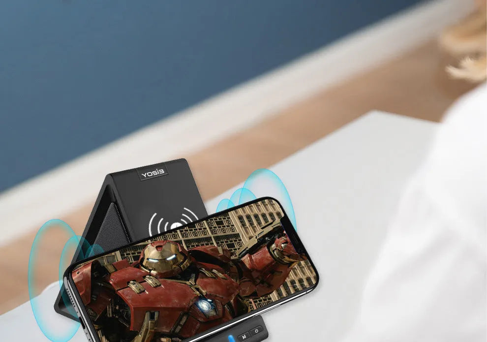Black multifunctional Bluetooth speaker with built-in mobile phone stand and power bank charging port.