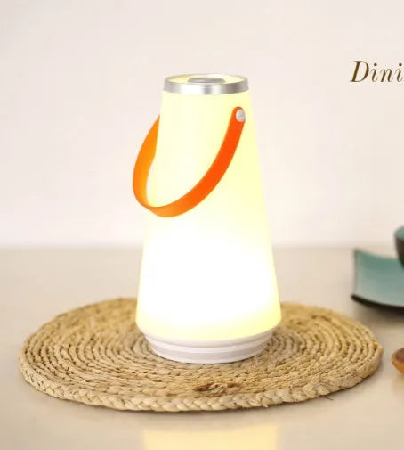 White rechargeable LED bedside lamp with USB charging cable showing dimensions 12x12x22cm