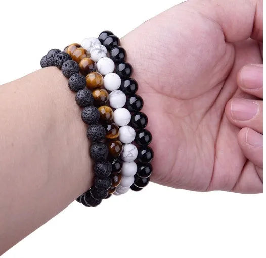Black onyx geometric bracelet with 8mm beads on a stretchy elastic cord.