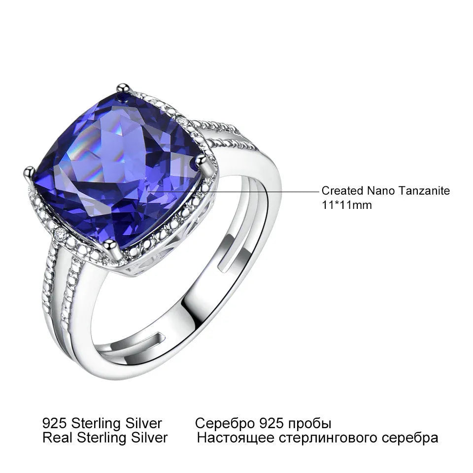 Blue tanzanite stone set in a sterling silver women's ring, shown in size 8.