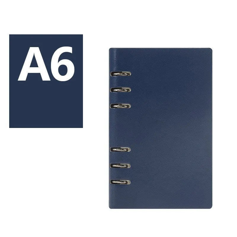 Loose-leaf business notebook in seaweed green imitation leather cover showing A5 size with beige paper