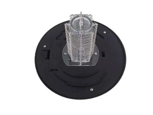 Black solar powered insect killing mosquito lawn lamp with white and purple light LEDs in a garden setting.