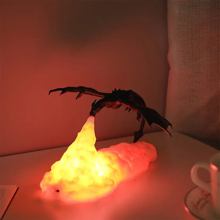 3D printed fire-breathing dragon night light with warm red glow and USB charging cable