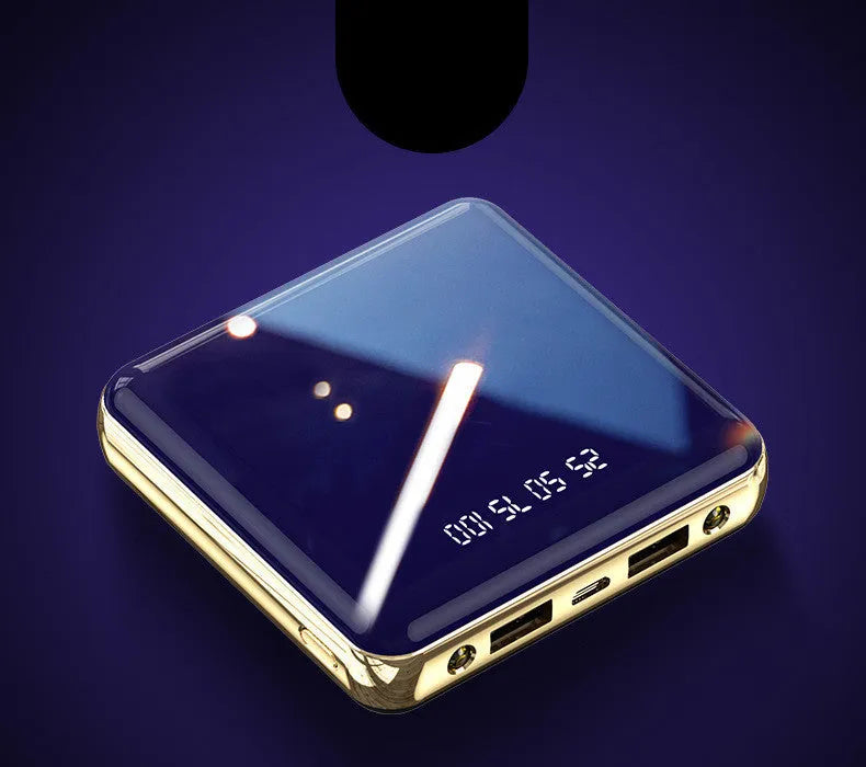Blue mini cylindrical power bank with 20000mAh capacity showing USB output ports