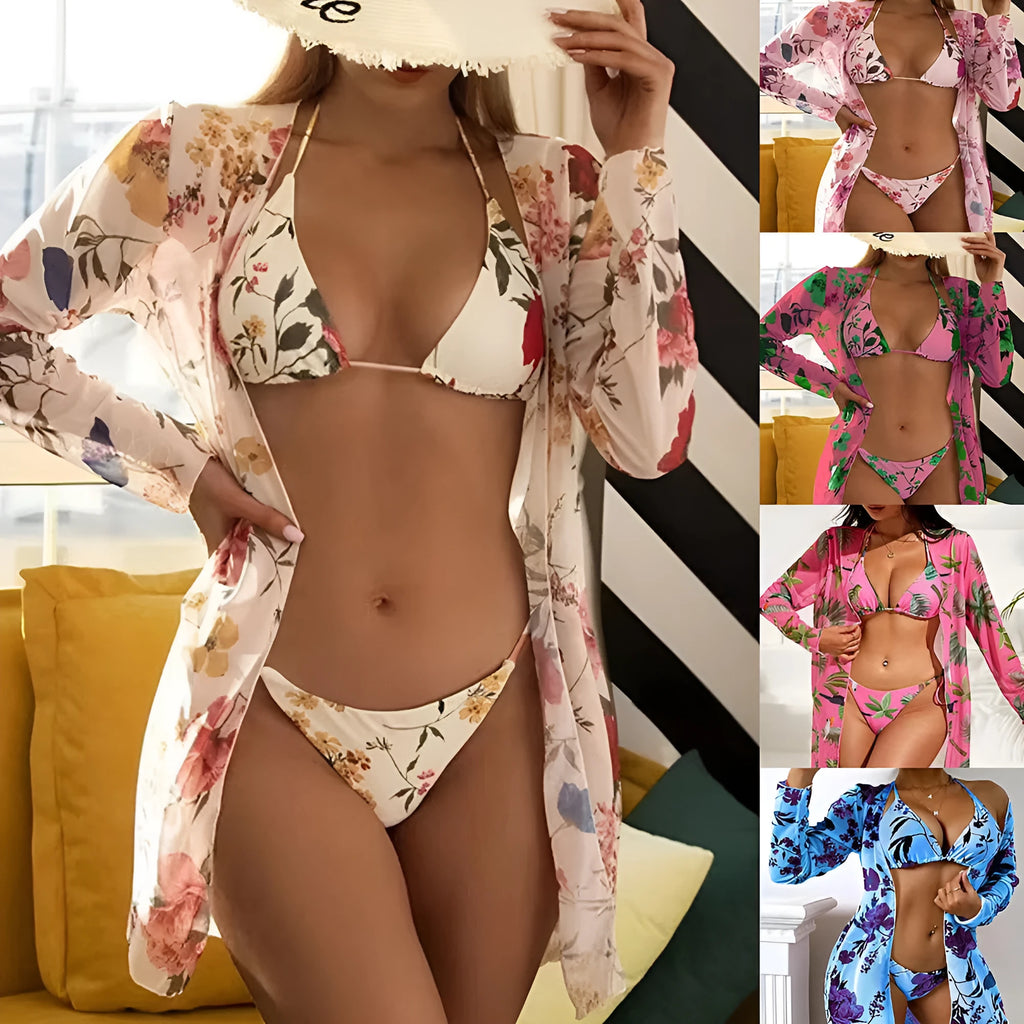 Women's floral printed mesh cover-up blouse over a swimsuit, part of a three-piece beachwear set.