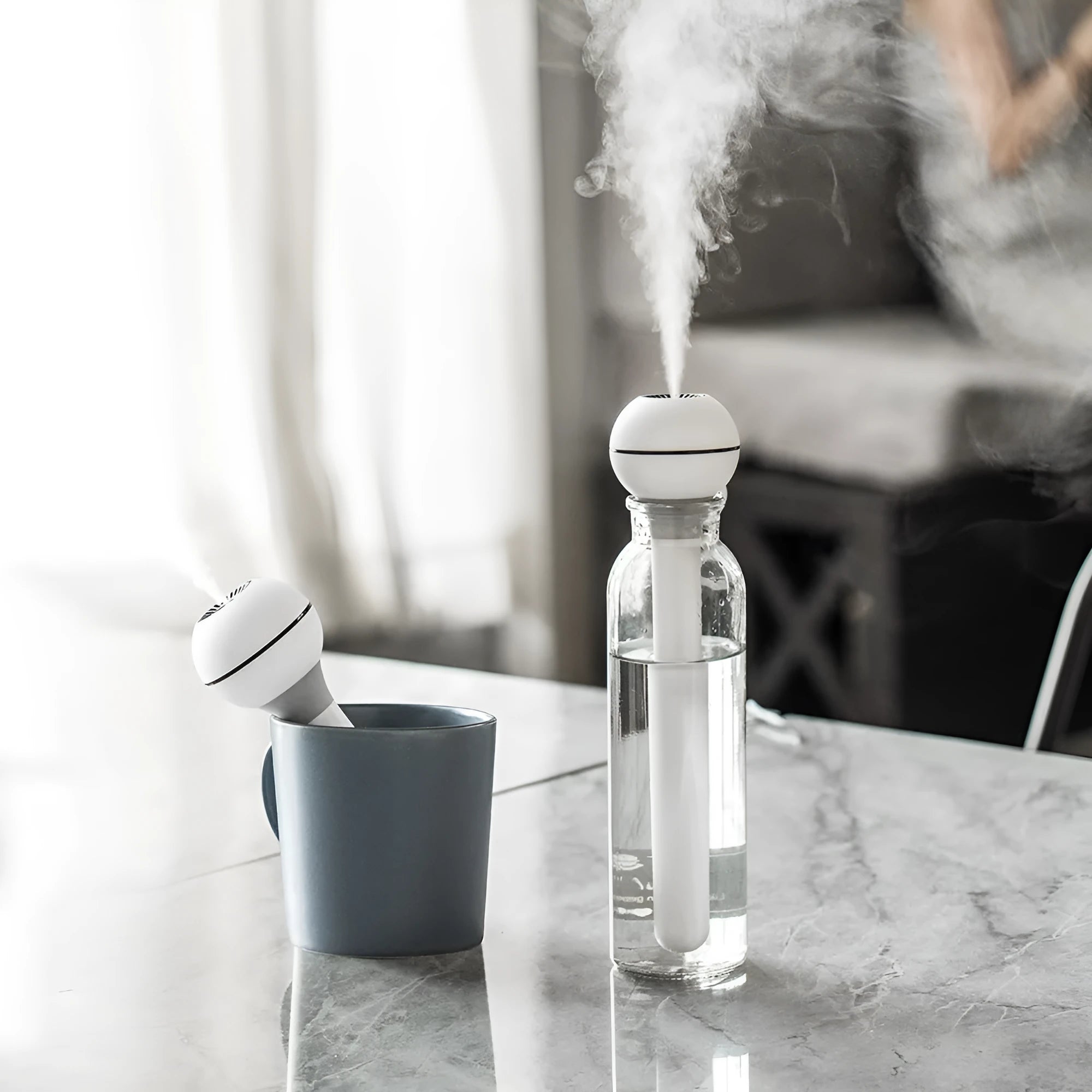 Pink and white column-shaped USB-powered ultrasonic humidifier with 1 litre water tank