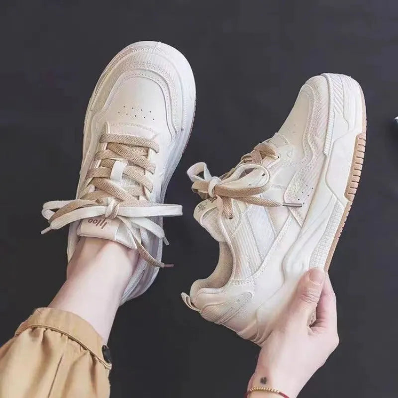 Women's pink and beige low-top height increasing sneakers with rubber soles