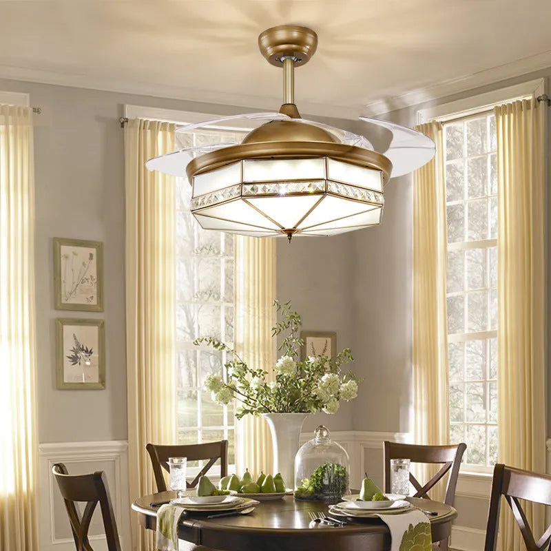 Gold 42-inch ceiling fan light with invisible blades and remote control on a white ceiling