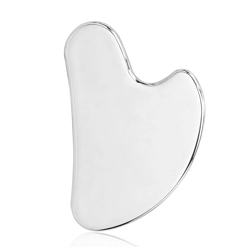 Stainless steel double-headed facial roller and gua sha scraping plate set with heart-shaped eye tool.