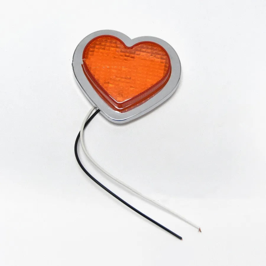 Heart-shaped red LED sidelight for car or motorcycle fender in large size.