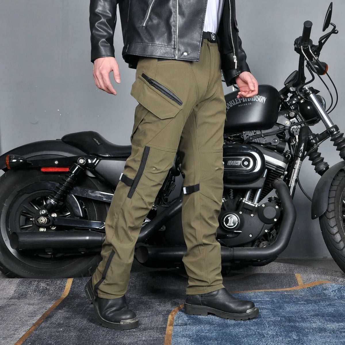 Men's waterproof motorcycle cycling trousers in black or green with included belt and protective gear.