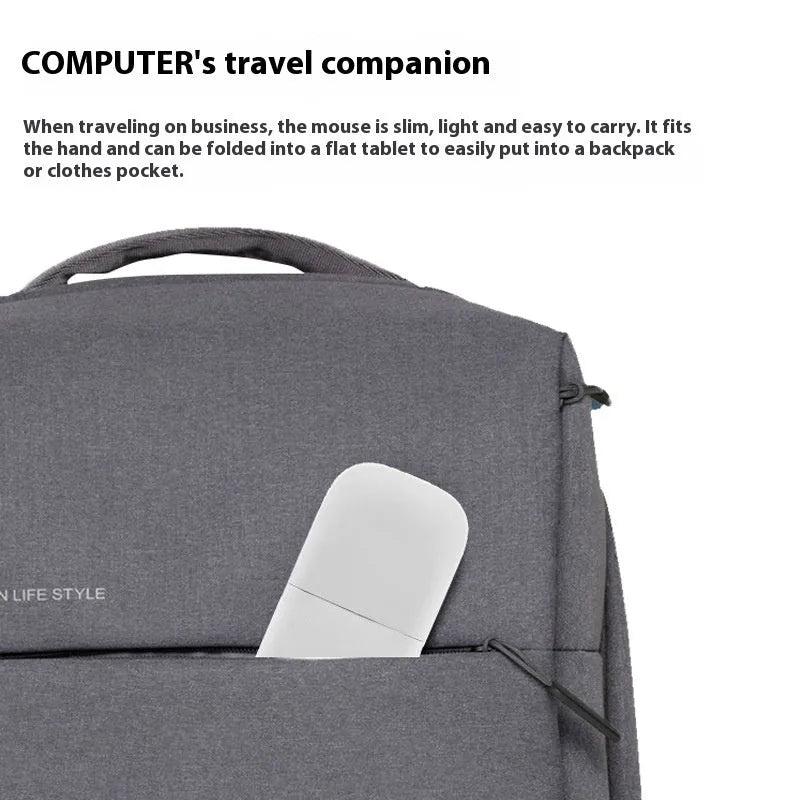 Black folding Bluetooth wireless mouse showing touch scroll area and compact folded size