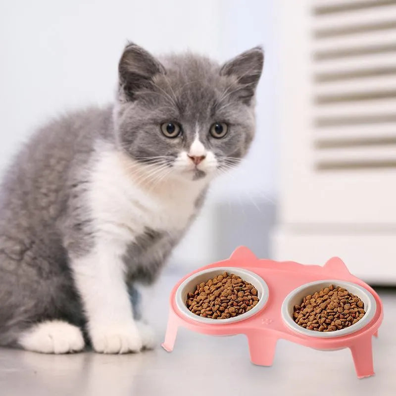 Ceramic elevated cat feeding bowl set with tilted bowls and stand in blue, pink, white or yellow