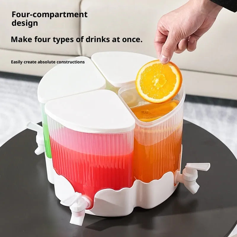 Rotating refrigerator water jug with faucet and four compartments in glacier pattern for cold drinks.