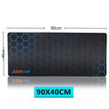 Custom cute cartoon design mouse pad on a desk, showing large size fitting keyboard and mouse.