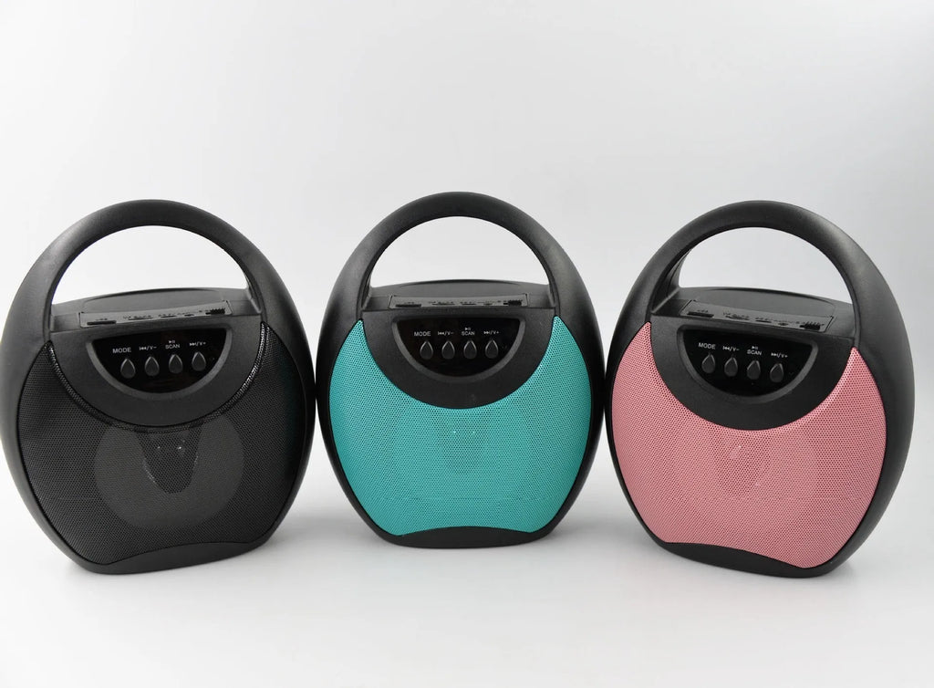 Portable Bluetooth speaker in black, blue, or pink with USB and SD card slots