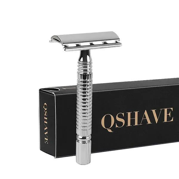 Chrome double-edged safety razor with metal handle, one blade, and a storage box.