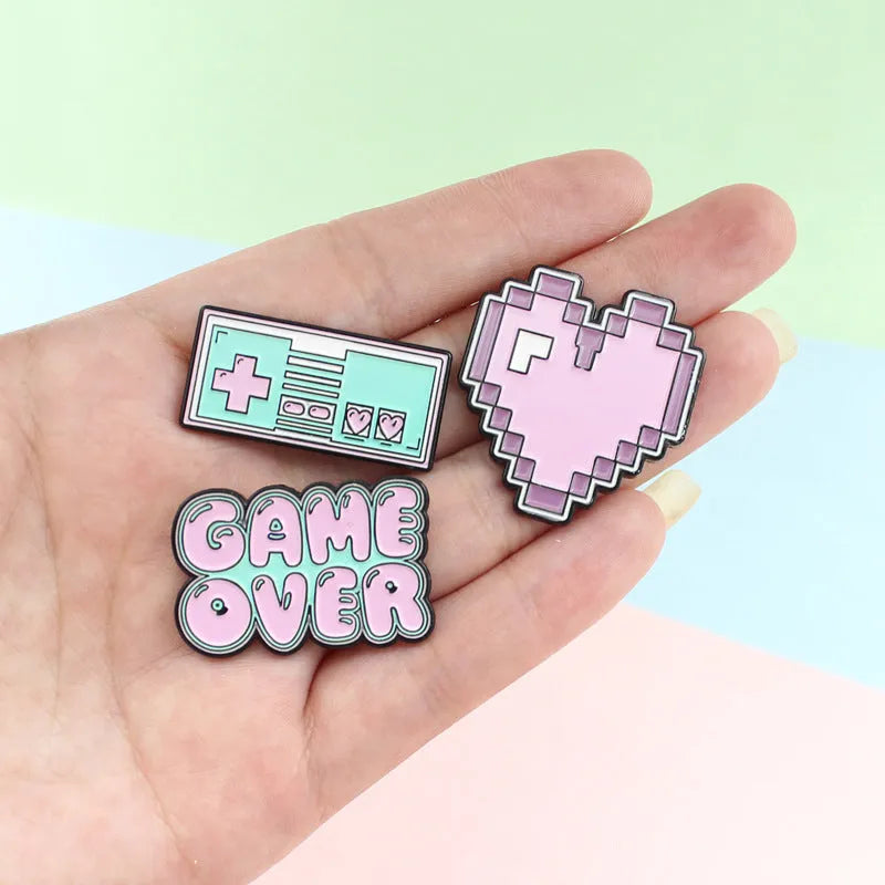 Stereo game console alloy badge in independent OPP packaging with colour options CC1122, CC1123, CC1124.