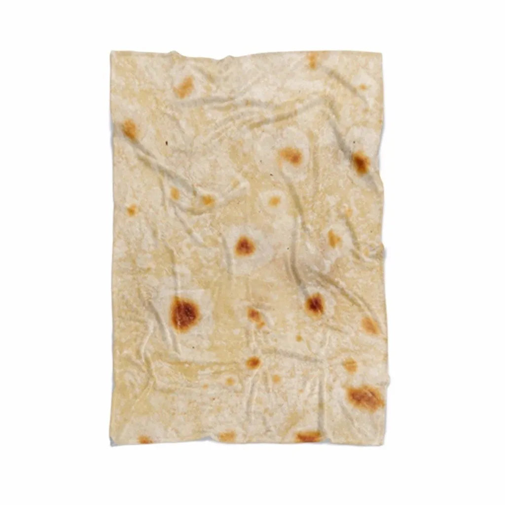 Round coral-coloured flannel burrito blanket with a delicious food print, folded to show soft texture.