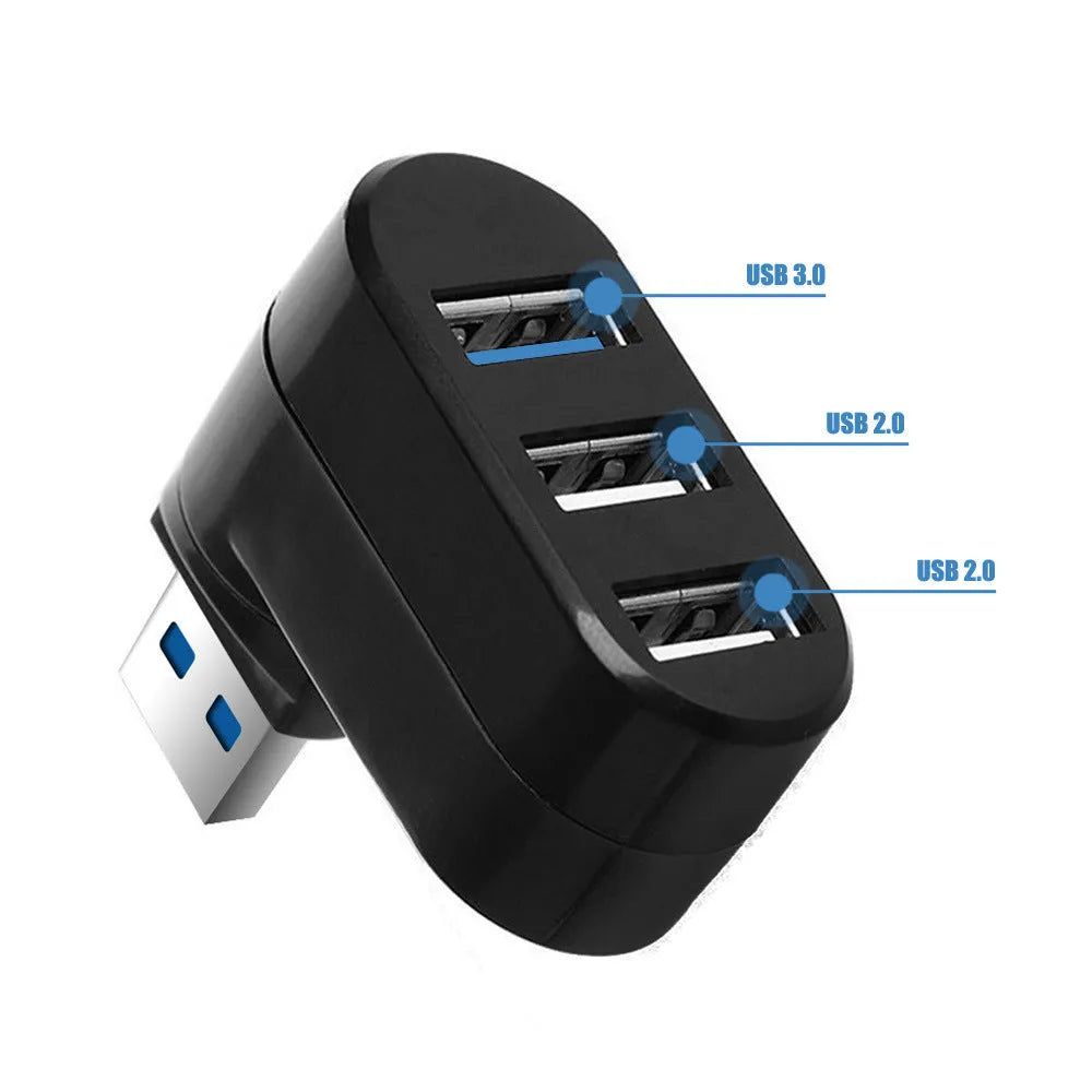 Black and white USB 3.0 hub with four ports and a rotating design on a desk.