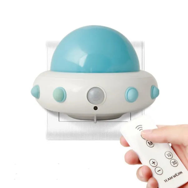 Blue remote control UFO shaped bedside night light with dimensions 105x76x58mm
