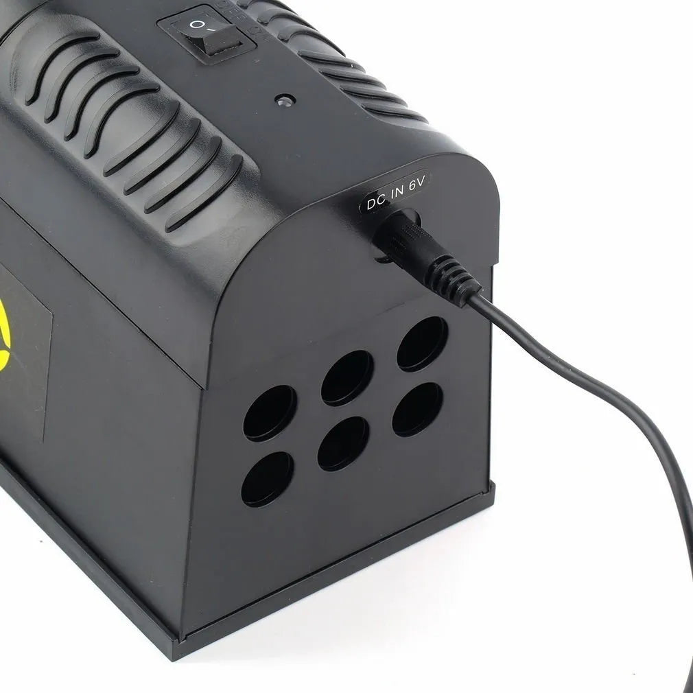 Black high voltage electronic rodent killer unit with plug options for UK, EU, or US/Chinese electrical systems
