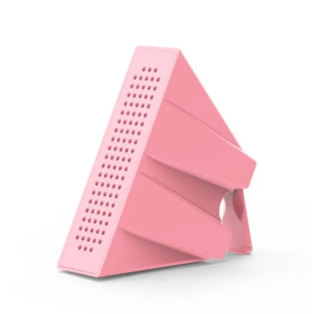 A portable black ABS mobile phone amplifier bracket holding an iPhone to boost sound for desktop use.
