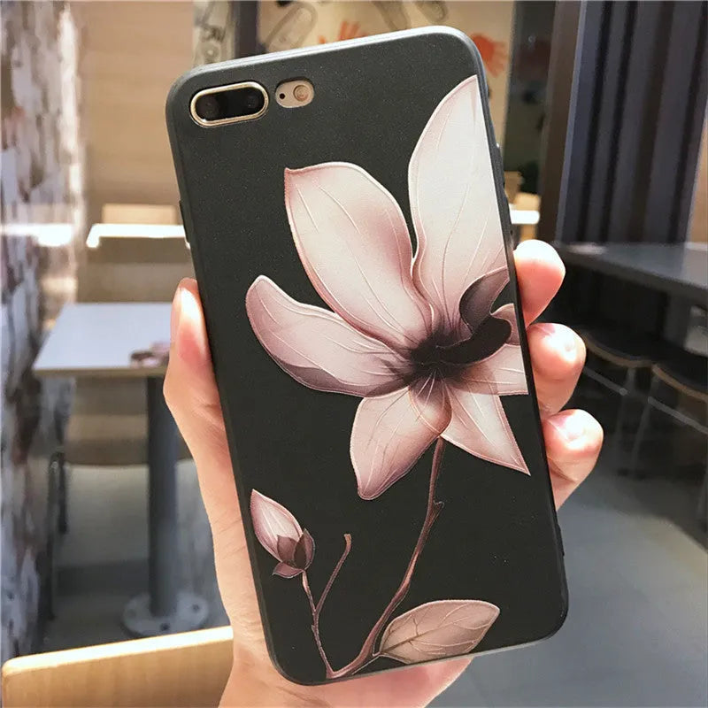 Embossed floral TPU phone case for iPhone in black and white colour options showing raised pattern detail
