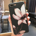 Embossed floral TPU phone case for iPhone in black and white colour options showing raised pattern detail